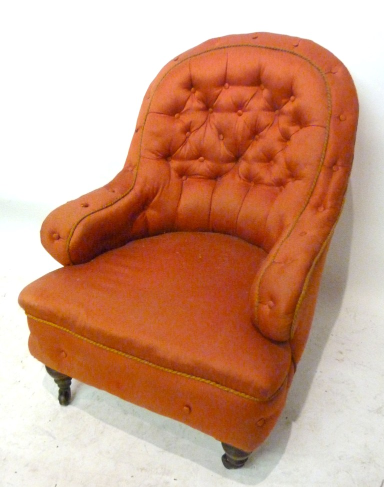 A Victorian Upholstered Tub Shape Chair, the button upholstered back above a stuffover seat,