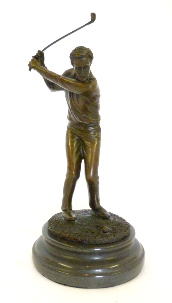 A Patinated Bronze Model, in the form of a golfer, upon circular marble plinth, 32cms high