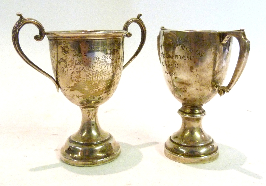 A Birmingham Silver Presentation Trophy Cup, together with another similar two handled trophy cup,