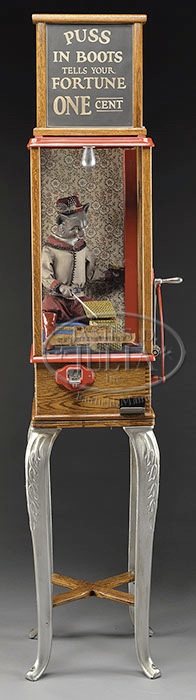 ROOVERS "PUSS AND BOOTS" FORTUNE TELLER MACHINE.A classic mechanical fortune telling device