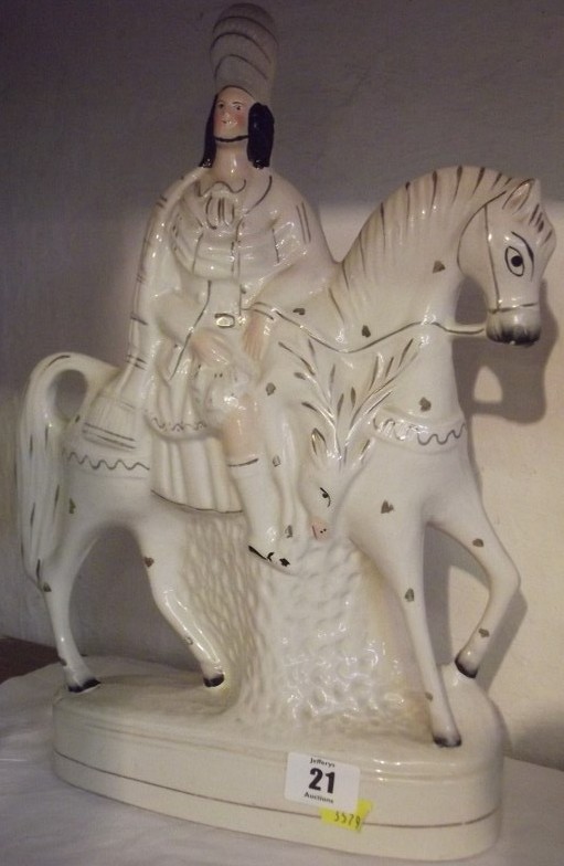 STAFFORDSHIRE POTTERY, pair of 19th Century equestrian Staffordshire figures of Highland riders