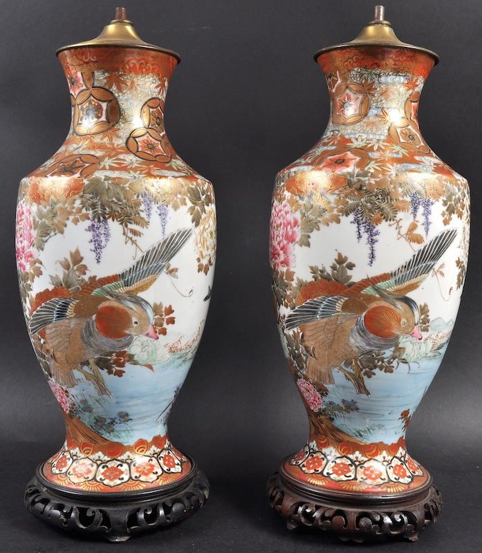 A PAIR OF LATE 19TH CENTURY JAPANESE MEIJI PERIOD KUTANI VASES converted to lamps, painted with bold