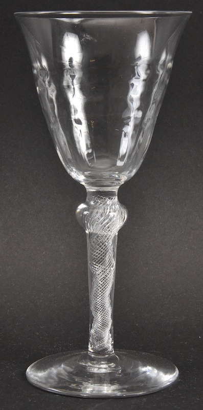 A GEORGIAN WINE GLASS with knop and air twist stem. 6.75ins high.