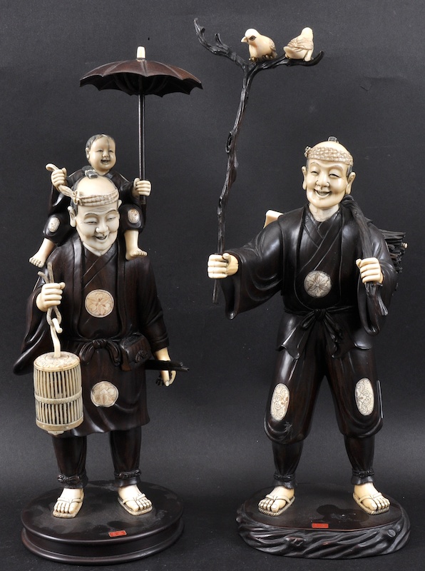 A PAIR OF EARLY 20TH CENTURY JAPANESE MEIJI PERIOD IVORY AND ROOTWOOD FIGURES each modelled upon a