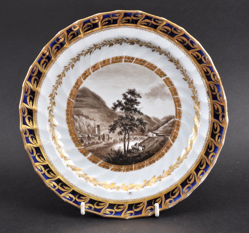 A LATE 18TH CENTURY CHAMBERLAINS WORCESTER PLATE painted with a landscape entitled Dolgelly. 8.25ins