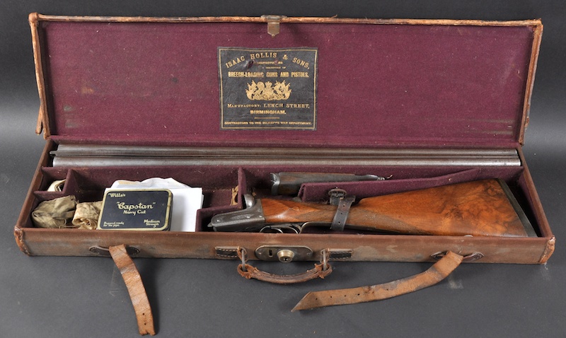 A GOOD 19TH CENTURY DOUBLE BARREL 12 BORE SHOTGUN BY ISAAC HOLLIS & SONS contained within a fitted