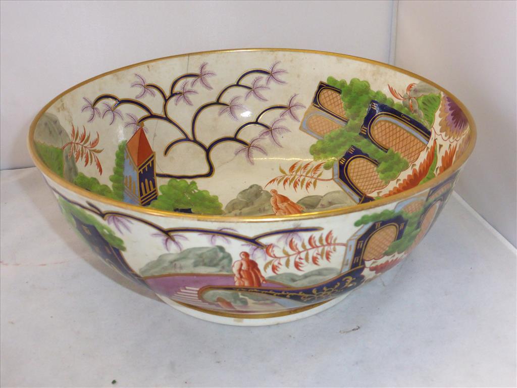 WONDERFUL QUALITY CIRCUALR BOWL WITH PROFUSE DECORATION DEPICTING A RUIN AND FIGURE, RIVETTED