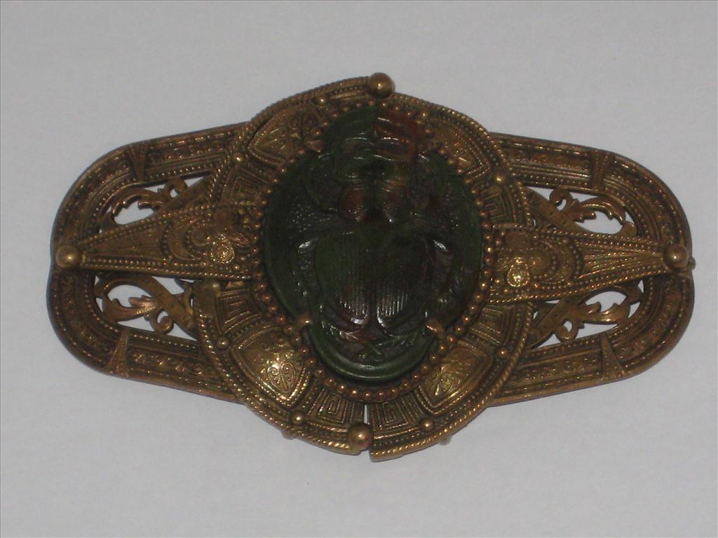 INTRICATELY DESIGNED BELT BUCKLE WITH LARGE CENTRAL SCARAB DECORATIONPostage Cost (basic) : £18