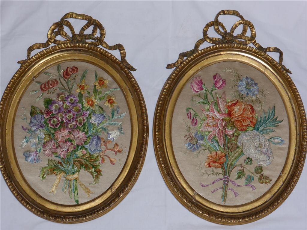 PAIR OF VERY GOOD QUALITY OVAL EMBROIDERED PICTURES DEPICTING FLORAL SPRAYS IN GILT WOOD FRAMES WITH