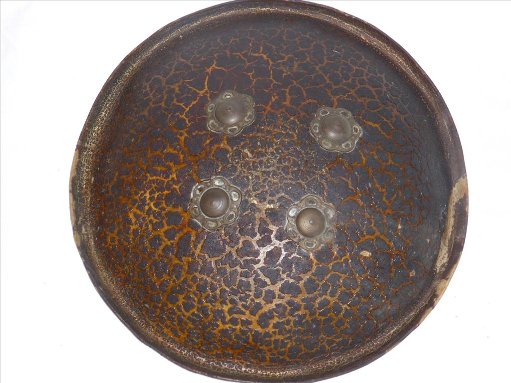 INDIAN HIDE SHIELD (DHAL) APPROX. 16 INS. DIA. WITH 4 ORNATE BOSSESPostage Cost (basic) : £ n/a