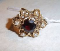 9ct gold ladies flower design dress ring set with six seed pearls & centre garnet - approx size S