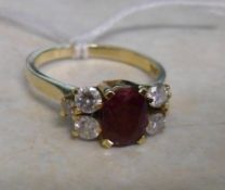 Ruby and 4 diamond 18ct gold ring - size approx M