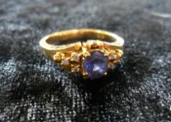 Foreign 18ct gold sapphire & diamond cluster ring, approx 1.25ct sapphire, three small brilliant cut