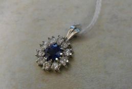 Sapphire and diamond 18ct white gold pendant