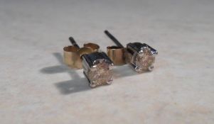 Pr of 9ct gold diamond stud earrings approx 0.2 ct