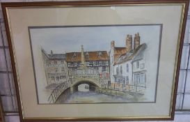 Framed watercolour depicting Lincoln from the river signed by M Jackson