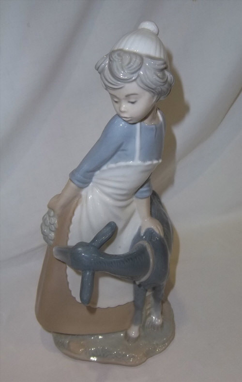 Nao figurine - girl with goat