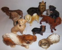 Sel of assorted ceramic dog figures