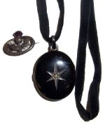 Vict black enamel mourning locket with centred seed pearl star & silver thistle brooch