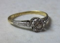 18ct gold and platinum solitaire diamond ring