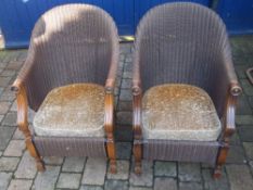 2 Lloyd loom arm chairs