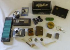 Old tins, smoking pipes, Zippo lighter, opera glasses, old camera etc