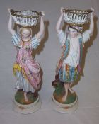 Pr of figurines Man & Woman with basket ht approx 29 cm