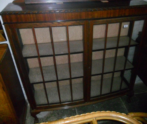An early 20th c mah bow fronted display cabinet