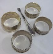 4 silver napkin rings circa 1937, 1939 and 1970 plus a silver handled cuticle remover circa 1899
