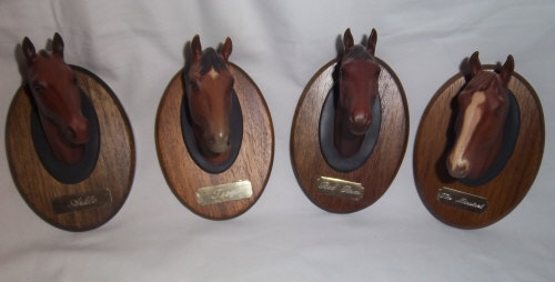 4 Beswick horse heads inc Redrum & Arkle