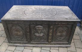 Heavily carved oak coffer