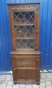 Oak and leaded glass panelled corner unit