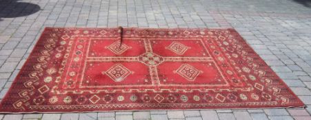 Lg red wool rug 117" by 78" approx