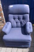 Blue upholstered reclining chair