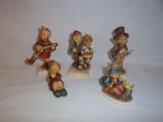 5 Hummel figurines "Singing Lesson", "Street Singer", "Girl With Horn", "Happiness" & "Volunteers"