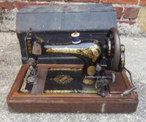 Singer sewing machine in case