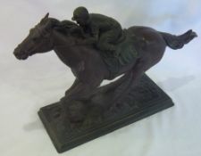 Resin figurine of a racehorse with jockey