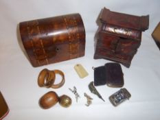 Miniature lacquered cabinet, strap ware box, 2 mauchlin napkin rings, cold painted figurines etc.