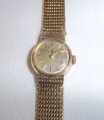 9ct gold Omega ladies cocktail watch on mesh strap with stick markers and hands