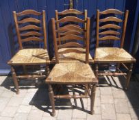 Set 4 oak ladder back chairs