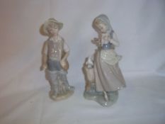 Lladro figurine of girl with doves & Lladro Daisa boy figurine