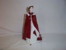 A Royal Worcester figure in celebration of the Queens 80th birthday 2006 in original box