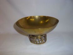 Hagenauer brass bowl supported on a pierced band depicting golfing figures among trees