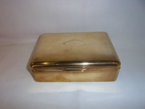 Brass cigar box with 'State Express Cigarettes' stamped to base