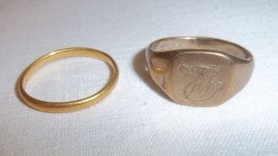 NOT AS PREVIOUSLY CATALOGUED:. 22ct gold wedding band (2g) & 9ct gold signet ring (4.89g)