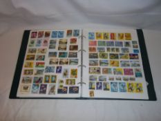 Album stamps inc. Guernsey, Gibralter, Ghana, Gold Coast etc.