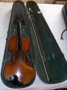 Cased violin & bow bearing paper label