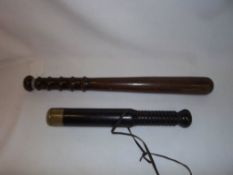 2 wooden truncheons