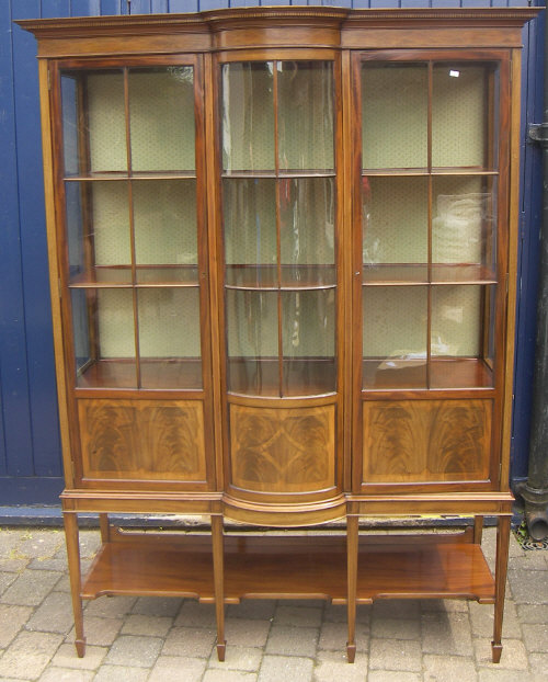 Sheraton revival mah. bow front display cabinet