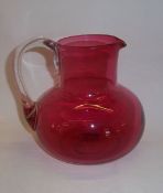 Cranberry glass jug with clear glass handle